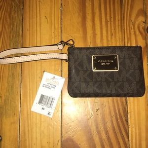 Michael Kors wristlet. Brand new!! NEVER BEEN USED